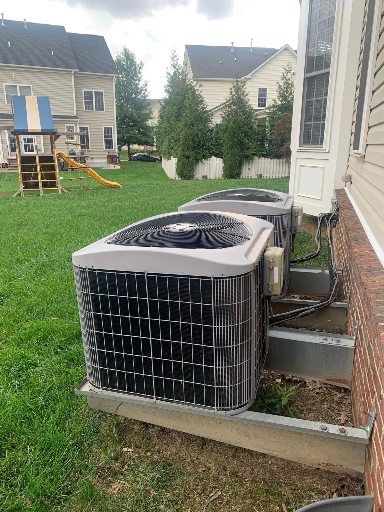 Family enjoying comfort in a home with a new energy-efficient HVAC system, highlighting long-term benefits